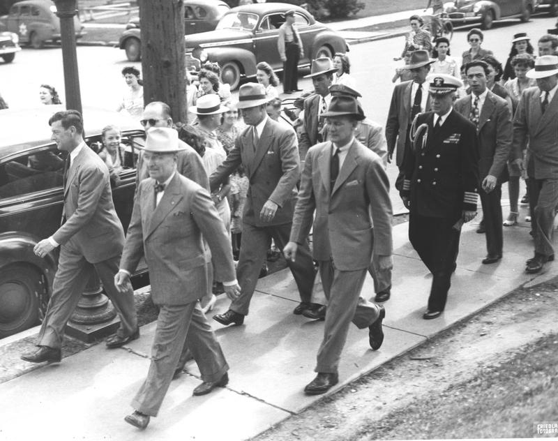 Image of Truman Walking in Independence with crowd